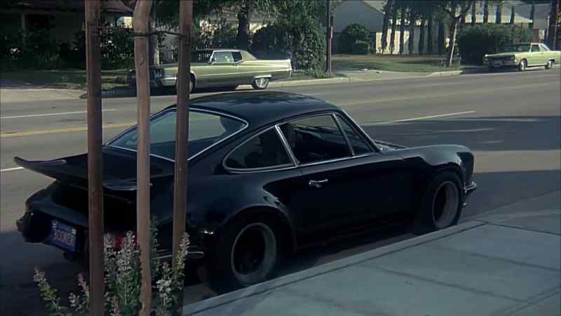 [CAR ENGINE REVVING]