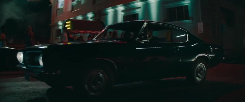 [car engine rumbles]