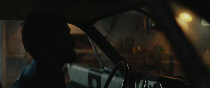 [car engine starts up]
