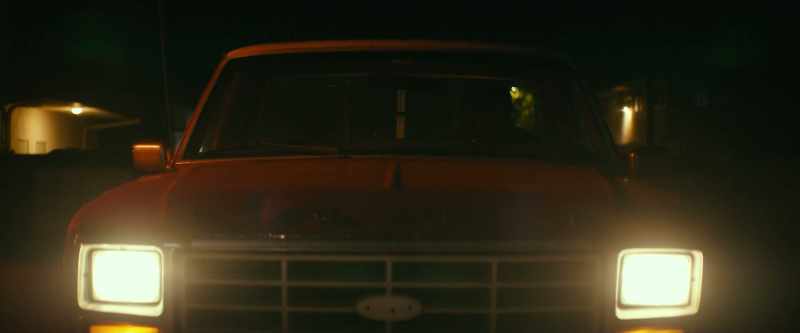 (car engine whirring)