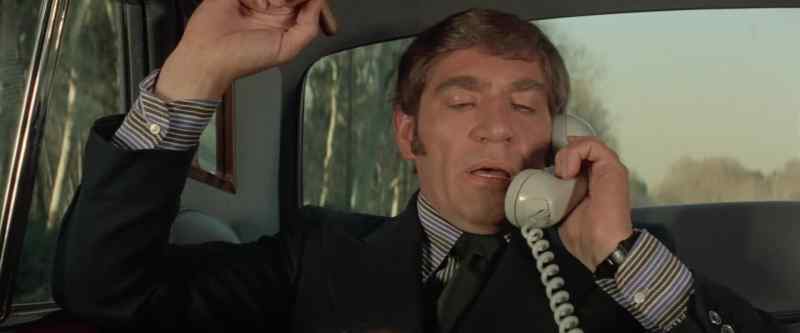[CAR PHONE BEEPS]