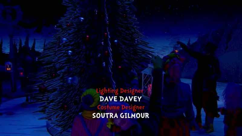 (carolers singing)