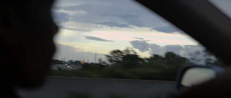 (cars driving by)