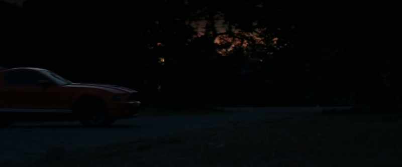 [cars revving]