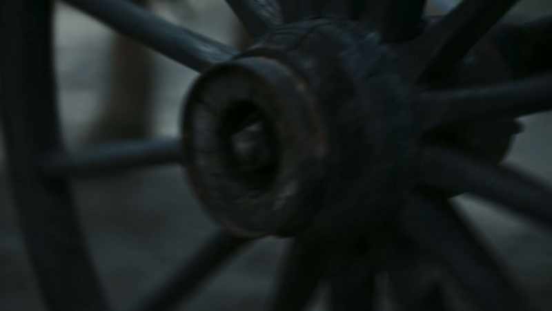 [cart wheels creaking]