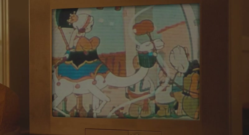 [cartoon sound effects on TV]