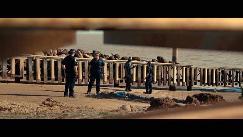 CASSIE: ..police officers standing around