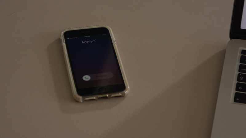 [cell phone buzzing]