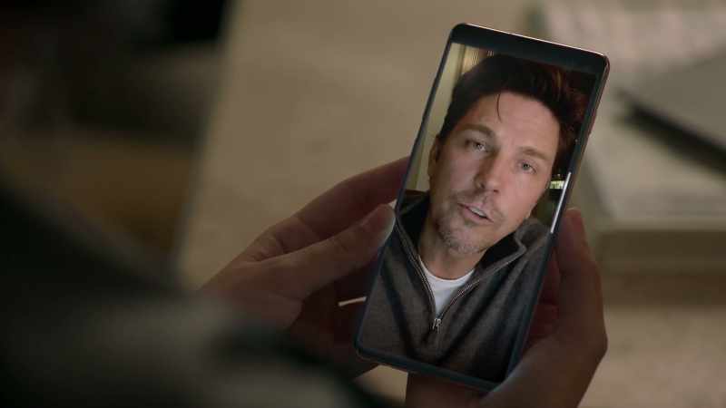 [cell phone buzzing]