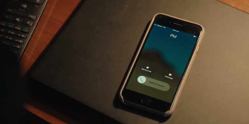 [Cell phone buzzing]
