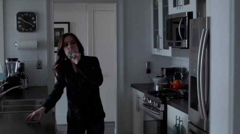 [Cell phone rings] How'd it go?