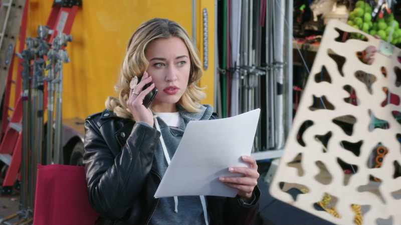 [cellphone rings]
