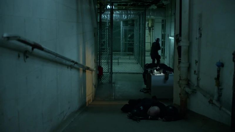 [chain-link fence rattling]