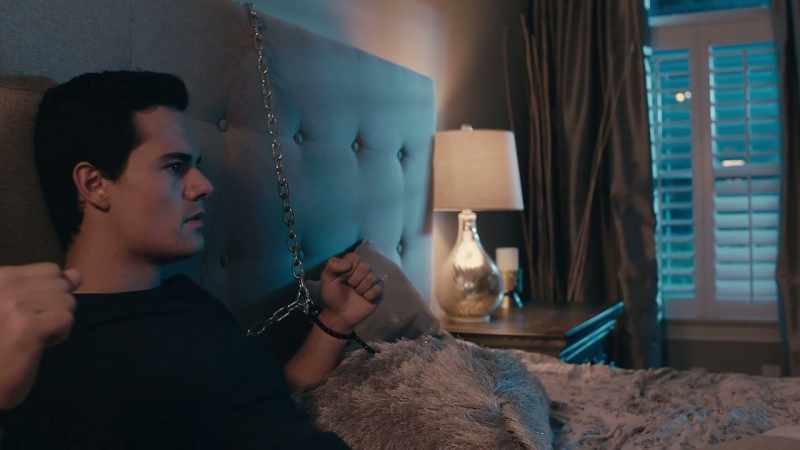[chains clanging]