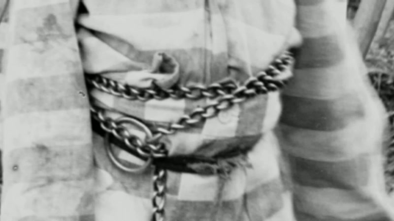 [chains jangling]