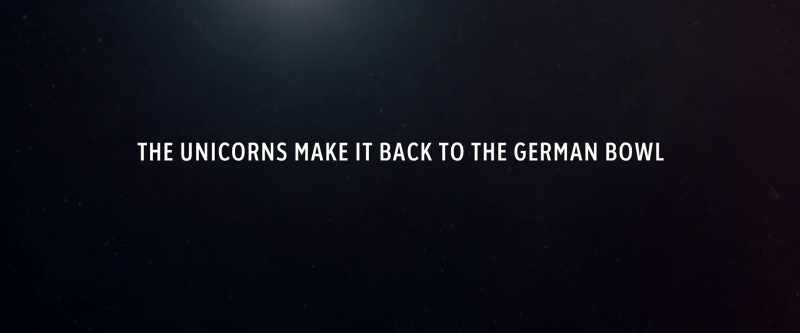 [chanting in German]