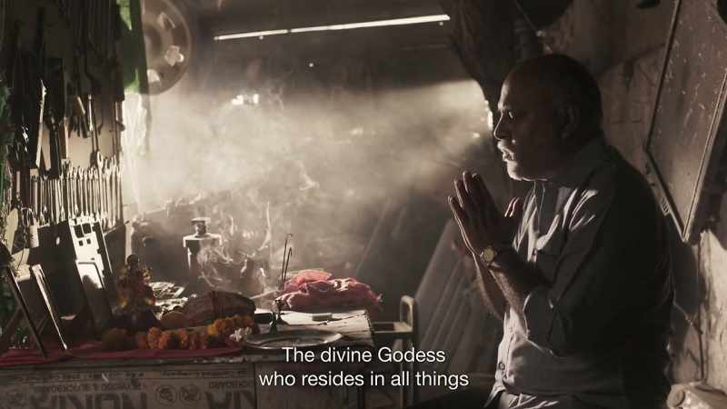 [chanting in Sanskrit]