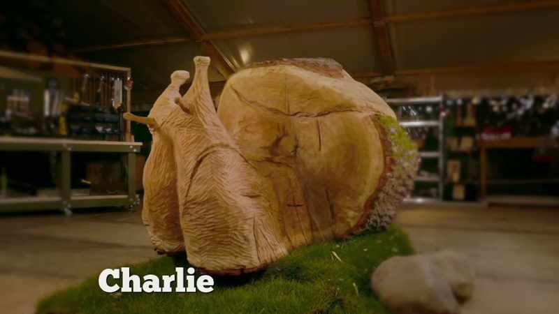 Charlie's carved a huge snail from oak