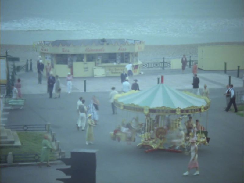 [chattering] -[carnival music]