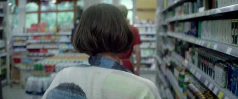 (checkouts beeping) (customers chattering)
