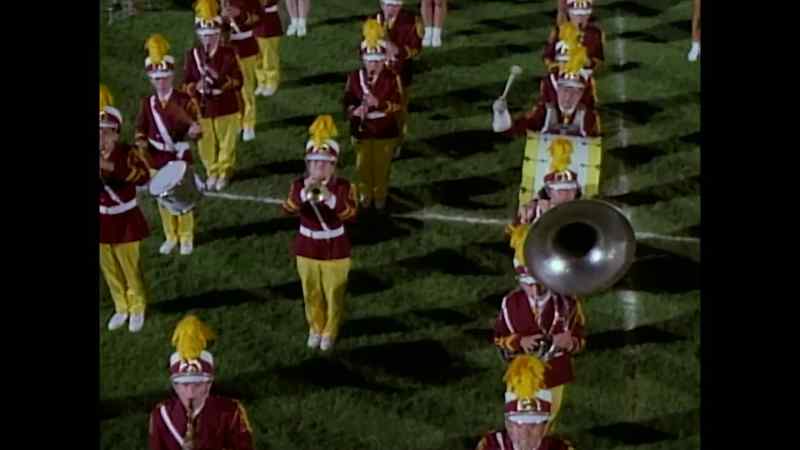 CHICK (ON PA): How about those marching Muskrats!