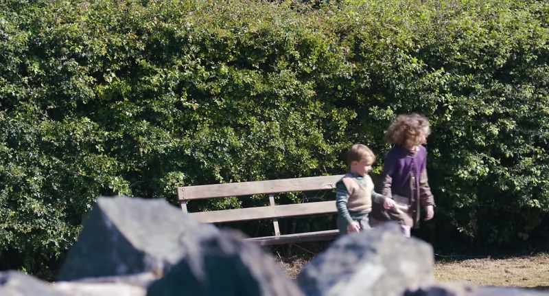 [CHILDREN PLAYING]