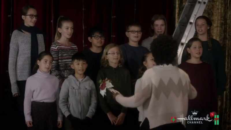 [Choir]: ♪ we wish you a merry Christmas ♪