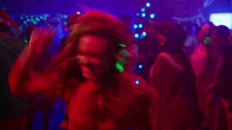 [Christmas dance music playing]