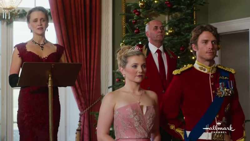 [Christmas music playing]
