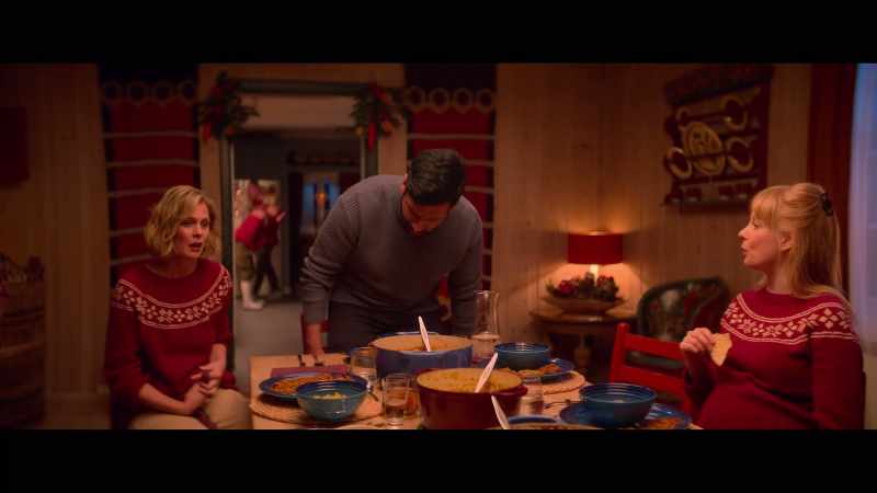 [Christmas music playing]