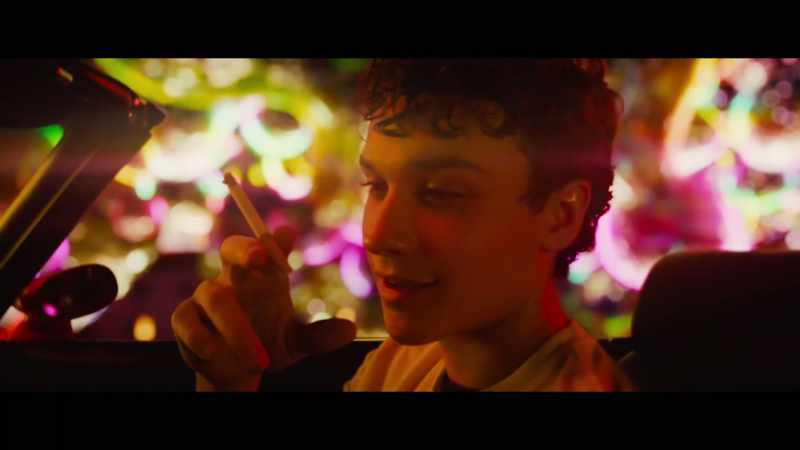 [cigarette sizzling]