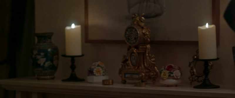 [clock playing tune]