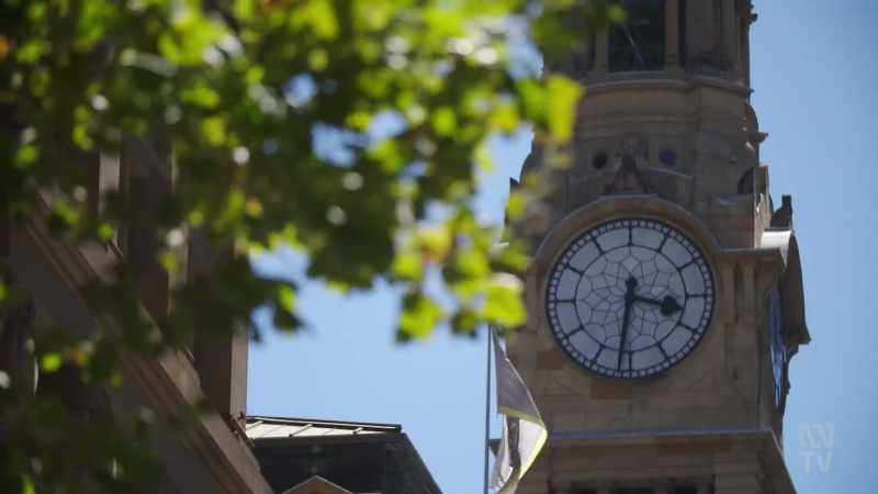 (CLOCK TOWER CHIMES)