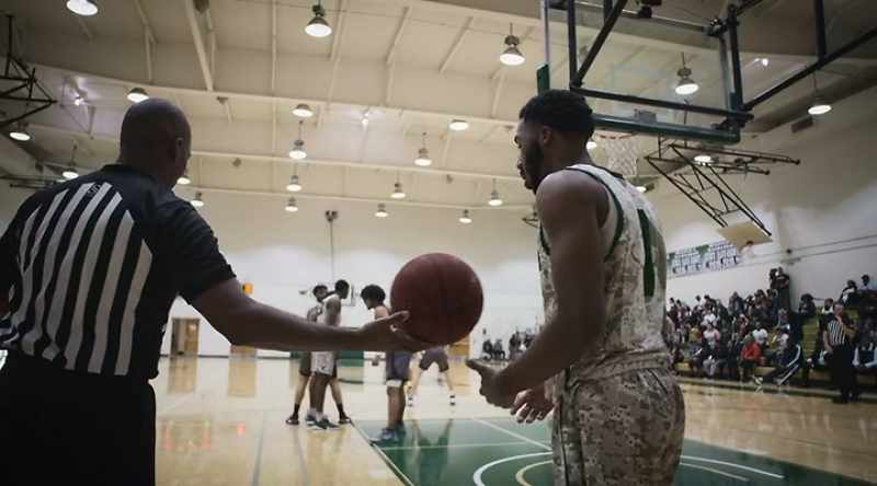 Coach Mosley, the old skipper, changing plays