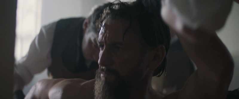 Cold, iron bars that have been pressed against his teeth