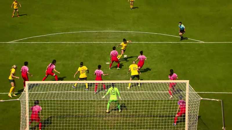 COMMENTATOR 1: Catley's ball in