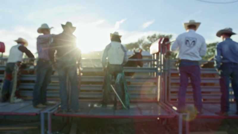 Competitors wait behind gates