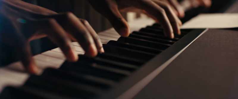 [continues playing notes]