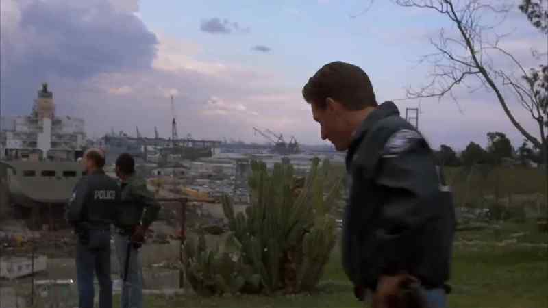 (cop) All right, get him on his goddamn feet. Now!