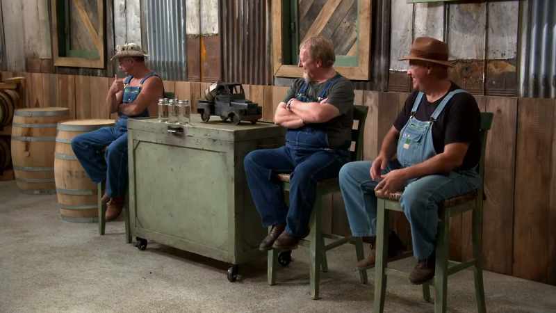[country music playing]