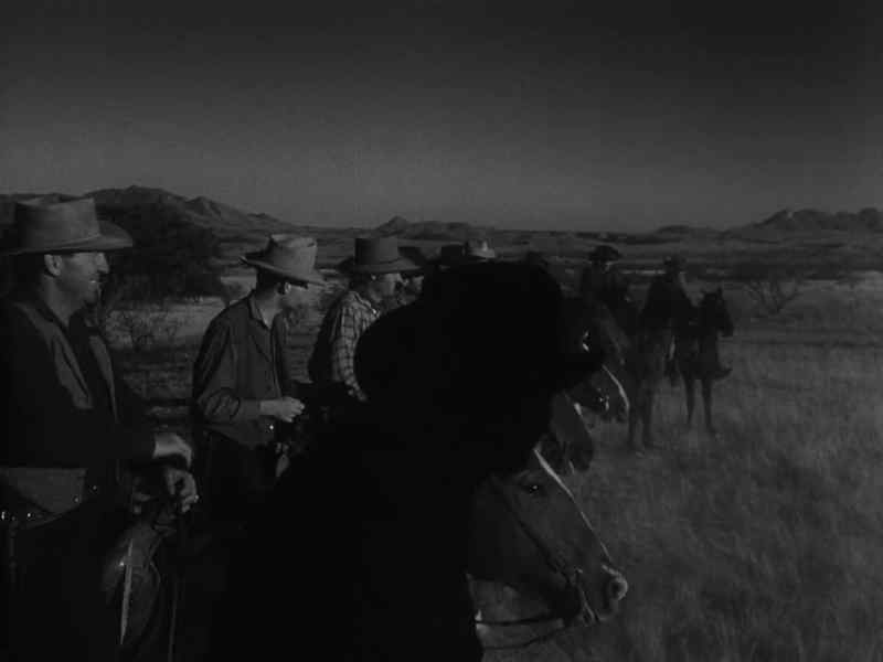 [cowboys shouting]