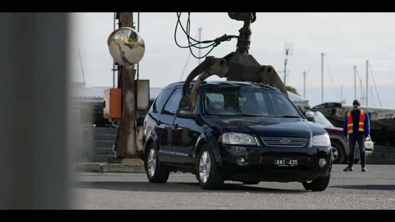 [crane smashes car]
