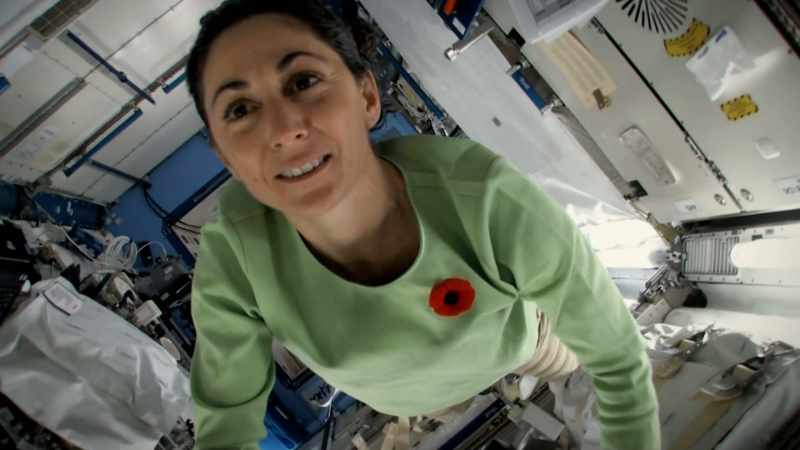 Crossing the hatch from the space shuttle into the space