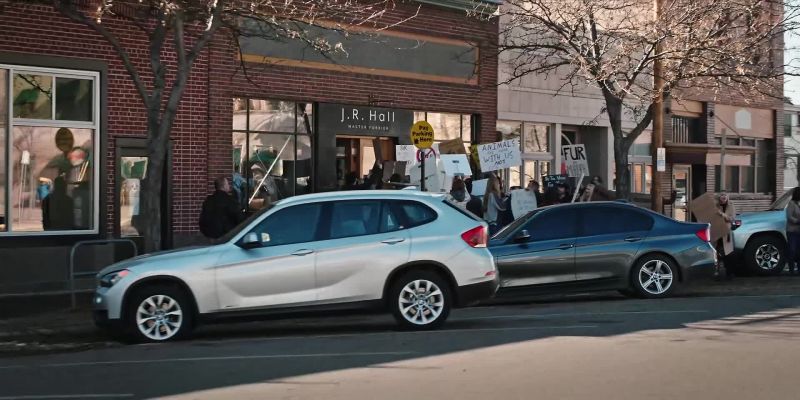 (CROWD CHANTING) Fur is murder! Fur is murder!