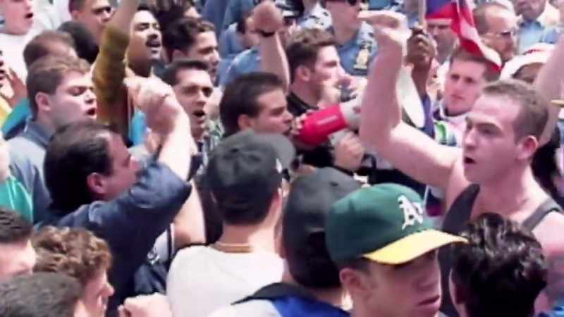 (crowd chanting)