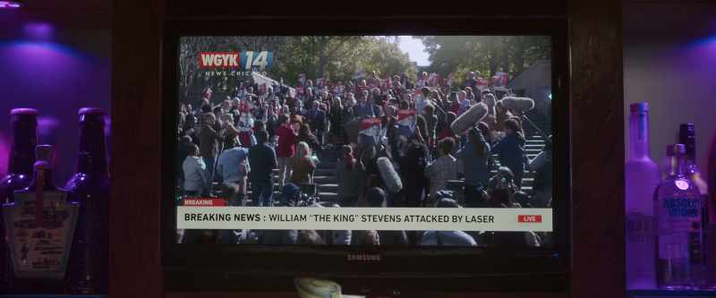 [crowd cheering on TV]