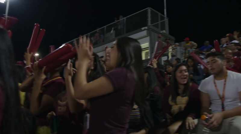 (crowd cheering)