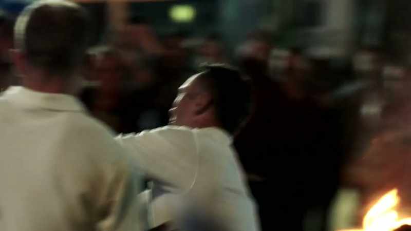 (crowd clamoring)