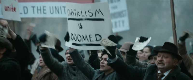 [Crowd protesting]