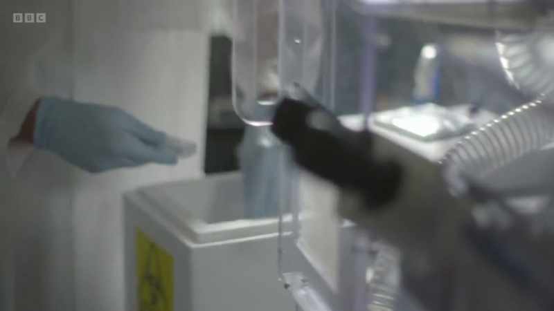 Dan uses advanced microscope technology to watch